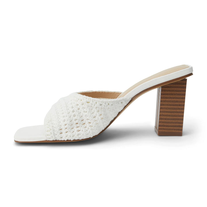 Breezy heeled sandal with intricate crochet upper.